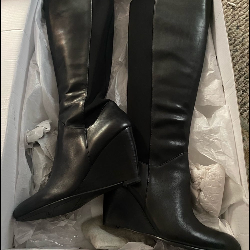 Calf length wedge boot